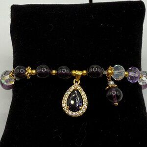 🐱 5 for $10.  Goldtone Stretch Bracelet with Purple & Clear Beads